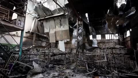 WARNING: GRAPHIC CONTENT - Russia, Ukraine trade blame after dozens killed in prison blast