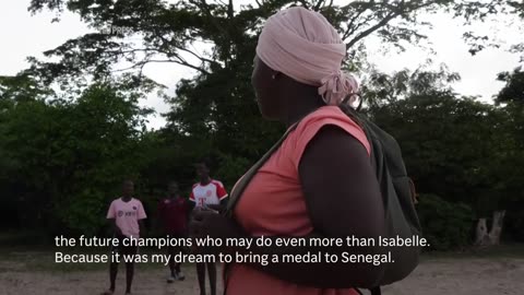 Senegal's most accomplished female wrestler returns home, hoping to give girls a chance in the sport