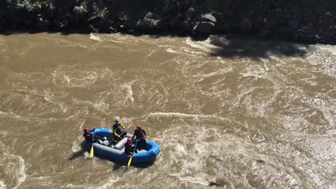 Whitewater Rafting Guides Practice Flipping Raft