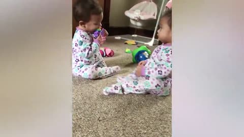 Funny twin babies