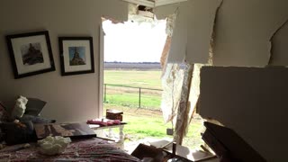 Truck Crashes Through Home Leaving a Big Hole