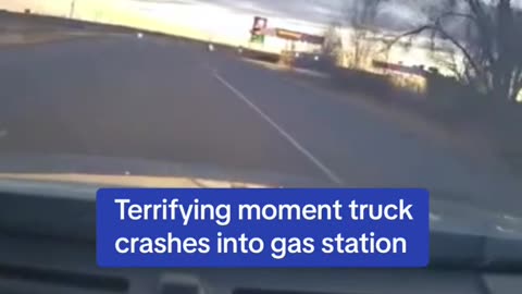 Dashcam footage of truck crashing into gas station