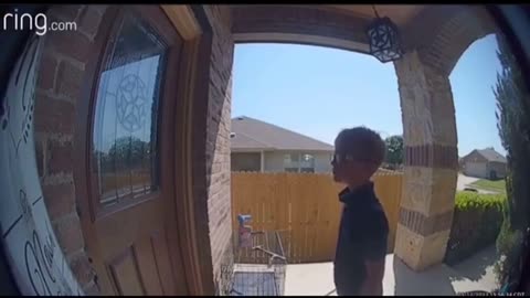 White kid bangs on a black neighbor's door with a whip