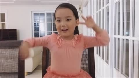 Little Girl Is Singing 'You Raise Me Up' Accompanied By A Piano