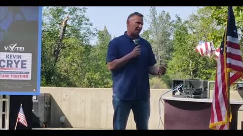 Kevin Crye speaks at the Rally on the River