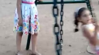 Nesrine and Aya in a playground