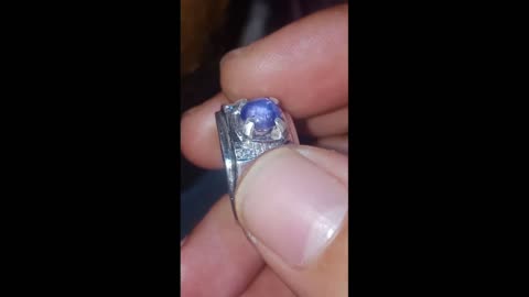 Violetish blue sapphire star