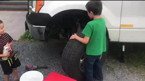 Installing tire for 4th birthday