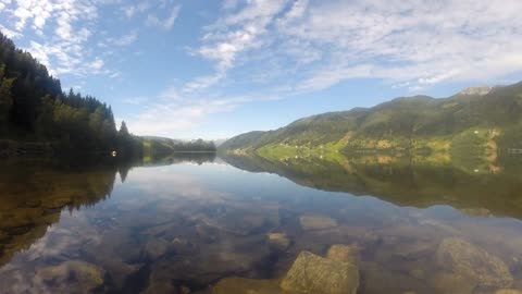 Short Time Lapse Video Of The Clouds Over a River.