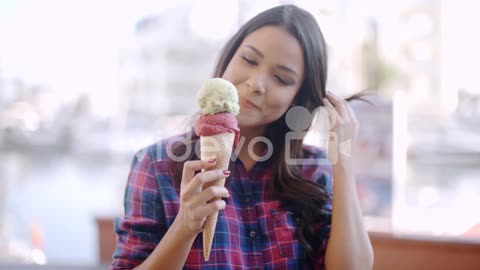 Girl Eating A Delicious Ice Cream