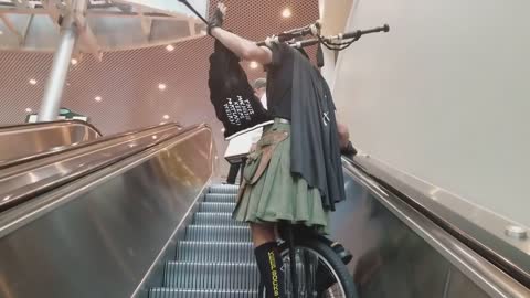 Bagpipe Unicycle Darth Vader vs. Escalator