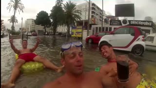 Guys get crazy in Ibiza after the big rain