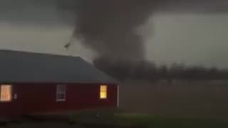 Footage of a highly perilous and destructive tornado in close proximity to Wapakoneta, Ohio