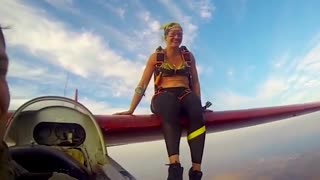 Woman Skydives Off the Wing of A Glider