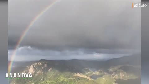 Hiker Captures Perfectly-Round Rainbow From The Top Of A Mountain