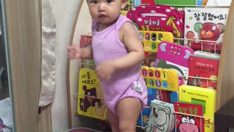Cute dancing pink baby