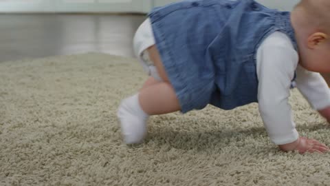 Baby Girl Crawling On The Floor....