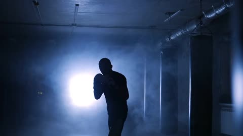 Boxer Workout in a Boxing Club Silhouette