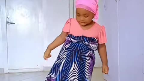 A girl wearing her Mummy clothe