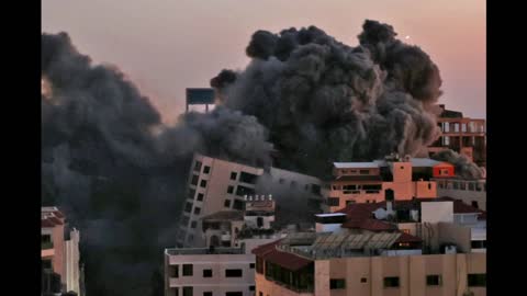 Gaza tower block collapses in Israeli airstrike