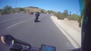 Biker Busts Through Wall