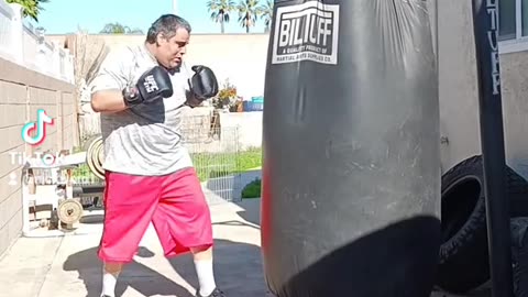 500LB Punching Bag Workout Part 10. Practicing power right hooks to the body and head!