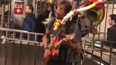 Epic one man band spotted in NYC subway