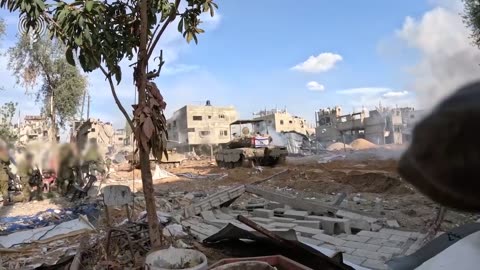 Israeli infantry and tanks in fighting in the Gaza Strip. 1