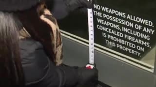 Reporter Measures 'No Weapons Allowed' Sign After Mass Shooting, Finds It's Too Small