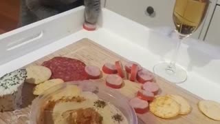 Cat Struggles to Steal Food From Charcuterie Board