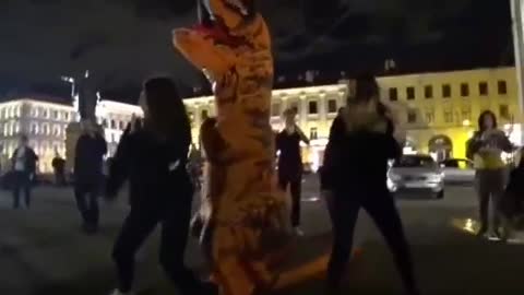 twerking with a dinosaur on Nevsky Prospekt