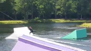 Yellow wakeboard white ramp fail