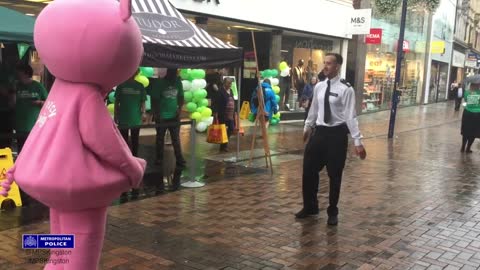 Police officer has a dance off with a Pig - Who's the winner?!