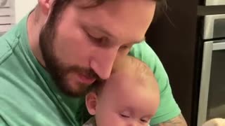 Watch this dad use his beard to put the baby to sleep