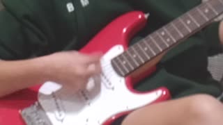 Bea on guitar