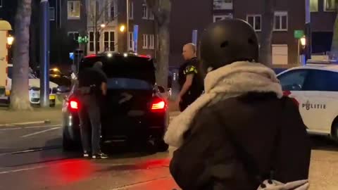 Dozens of armed response officers at "The Hostage Situation in Amsterdam"