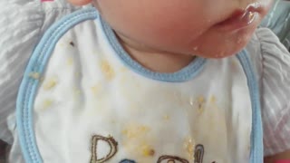 Cute Toddler eating while sleepy