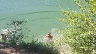 Rope swing lake shirtless bellyflop