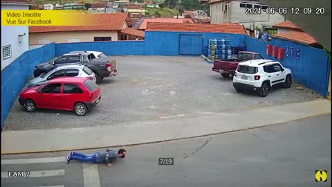 Man get flip over while crossing the road