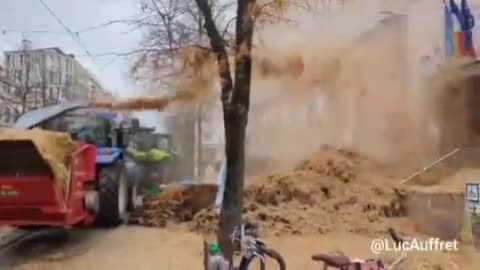 Farmers spray council buildings in Dijon France with manure.