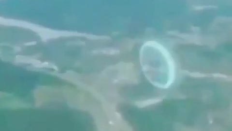A floating circle shape is filmed