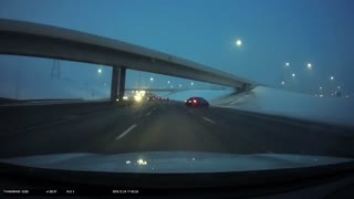 Strange Manoeuvre Causes Car to Slide on Highway