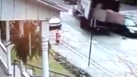 Box Truck Rolls Down a Hill, Hits Parked Car and Nearly Crashes into a House