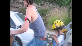 Toddler Gives Mom A Wedgie While She Rides A Bike