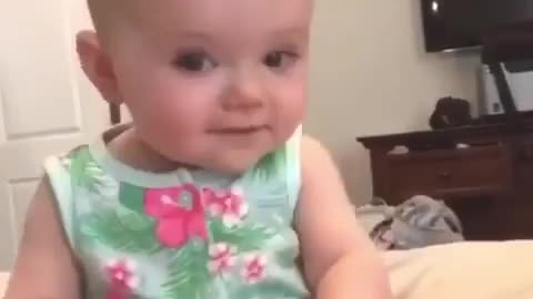 Baby showing its hilarious dance on music