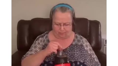Coca Cola y señora gorda