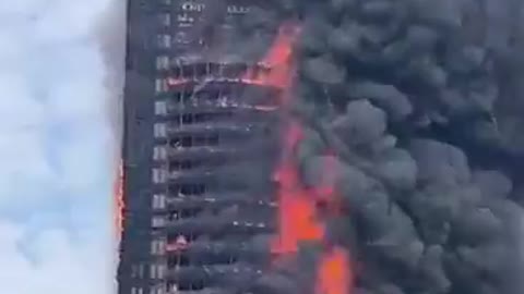 Massive fire engulfs 42-story China Telecom office building