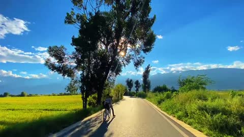 The sun shines, the most beautiful country road