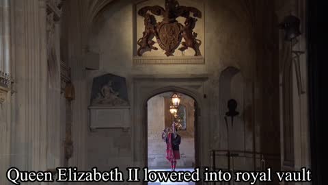 Queen Elizabeth II coffin disappearing underground into the royal vault at St. George’s Chapel