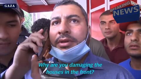 Israel (IDF) before airstrike call Gaza man to evacuate building